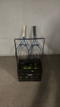 2 rackets + ~50 balls with carrier