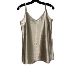 The Limited Silver Cami TopV-Neck Metallic Shiny  Excellent condition Adjustable Straps Wear alone or layer with sweater or jacket Approximate measure