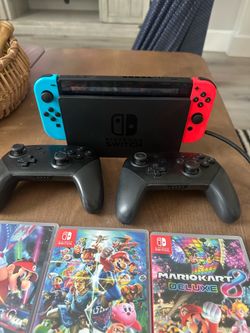 Nintendo switch with three games and + accessories