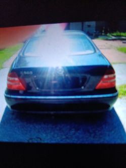 Navy blue  Mercedes Benz 4 door sadan