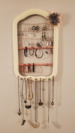 Wall mounted jewelry organizer handmade from an antique frame. (Jewelry NOT included)
