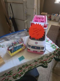 Barbie ambulance with accessories/ Tangeled sleepibg bag