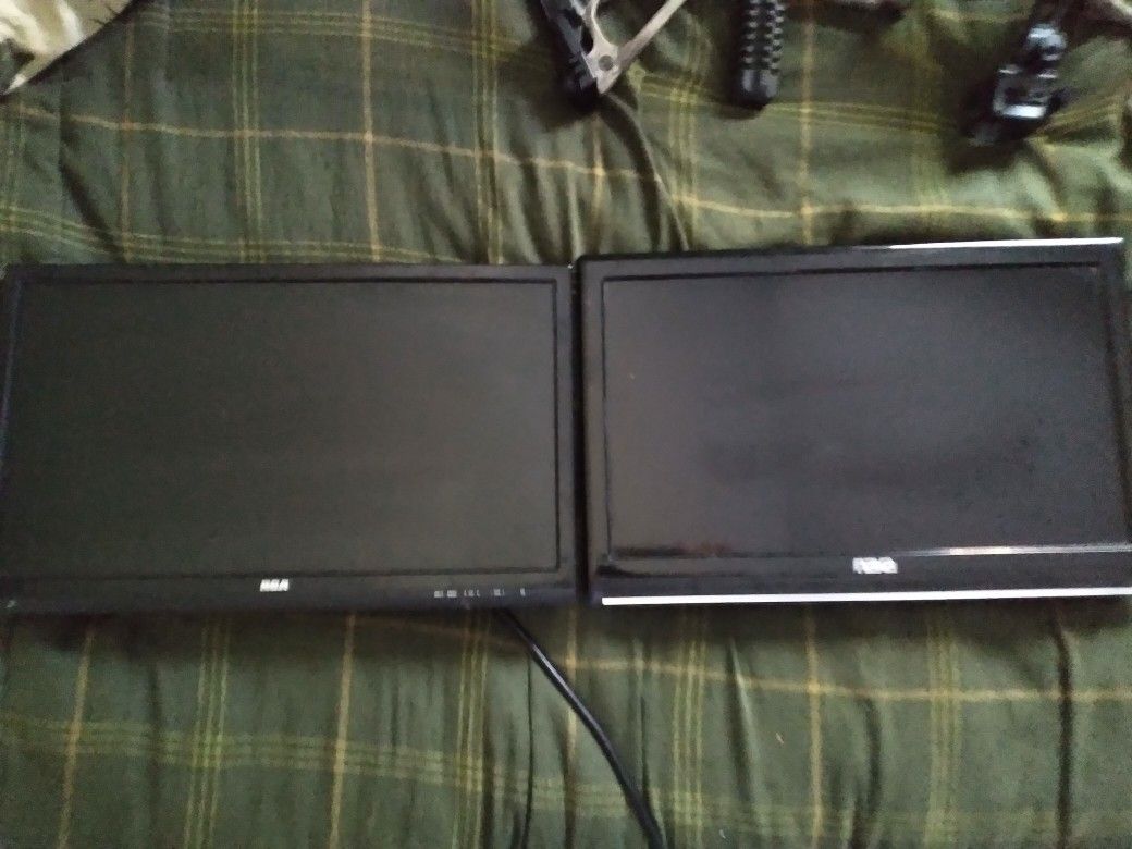 Two 20 Inch Tvs. With Built In DVD Players