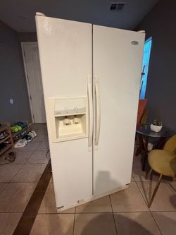 Whirlpool Side-by-Side Refrigerator with Ice Dispenser