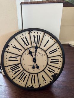 24 inch wall clock. Good condition