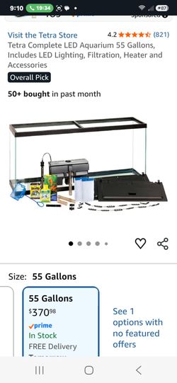 3 fish tanks and 2 stands