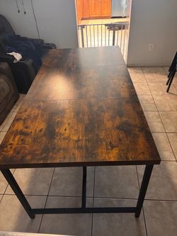 Wood table with metal legs