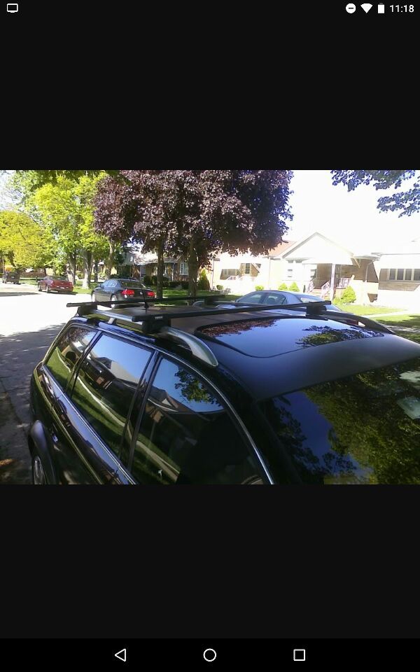 Thule 1054 roof racks mounts and 58 inch cross bars. for Sale in