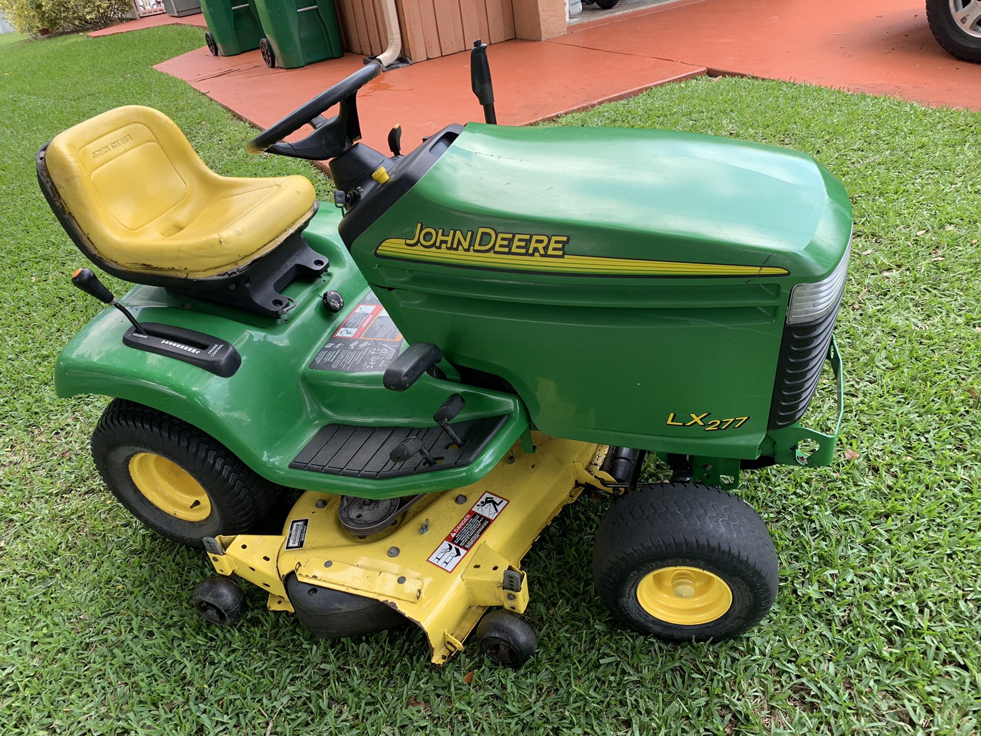 John Deere LX277 lawn mower / tractor with 48” cutting deck or D100 with 42 inch deck for $700
