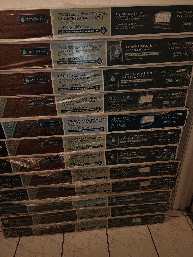 Toasted Cinnamon Oak Laminate Flooring System With Splash Defence