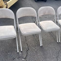 set a four folding chairs