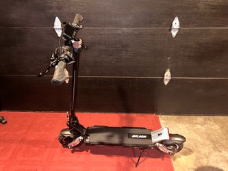 SPLACH THUNDER Dual Motor Electric Scooter.