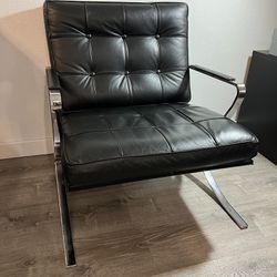 Italian black leather armchair