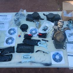Motorcycle Parts, Carbs, Chargers,and A50cc Engine, Tools Etc.