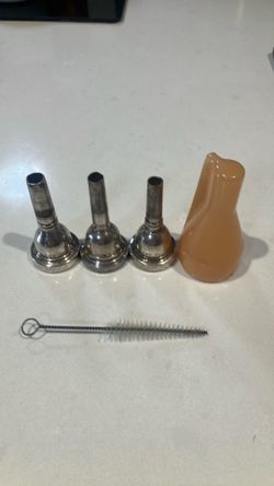 3 trombone / baritone mouthpieces and accessories