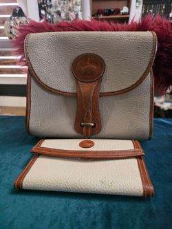 Vintage Dooney & Bourke pebbled leather crossbody bag and wallet with duck logo