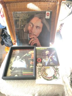 Bob Marley - Legend Vinyl 12 inch Vinyl on Gold Vinyl. New Sealed. Also 2 - 7 inch Vinyl Singles- New Sealed. With 3D 8x10 framed picture. All for $85