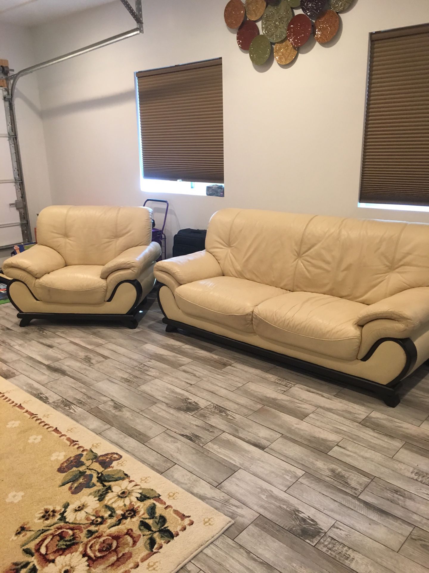 Cream leather couch and chair