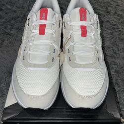 Size 11, men’s brand new unworn Adidas shoes with tags and box