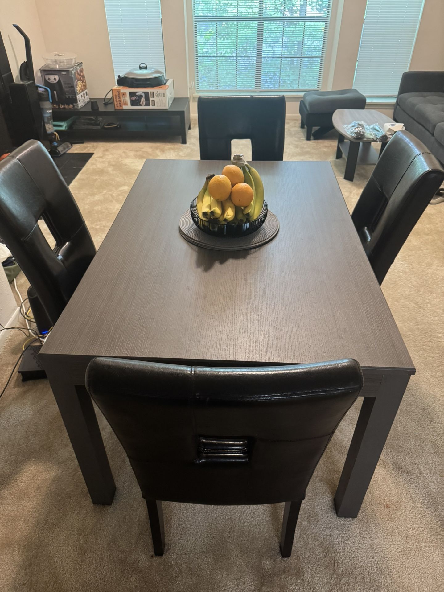 Gray Dining Tables With 4 Black Chairs