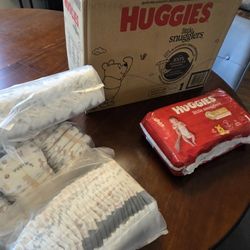 Size 1 Diapers And Playpen 