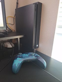 Xbox one x and blue camo controller