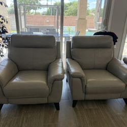 Two Gray Power Recliners From Living Spaces