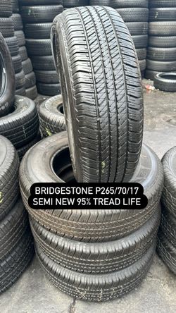 SET OF FOUR USED TIRES 265/70/17 BRIDGESTONE 