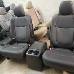 BRAND NEW BLACK LEATHER BUCKET SEATS WITH SEATBELTS AND CONSOLE 