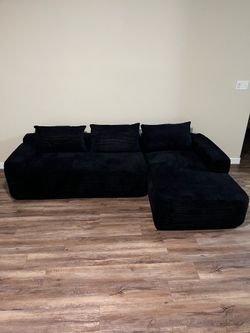 For sale boneless tix toc couch. New  $350
