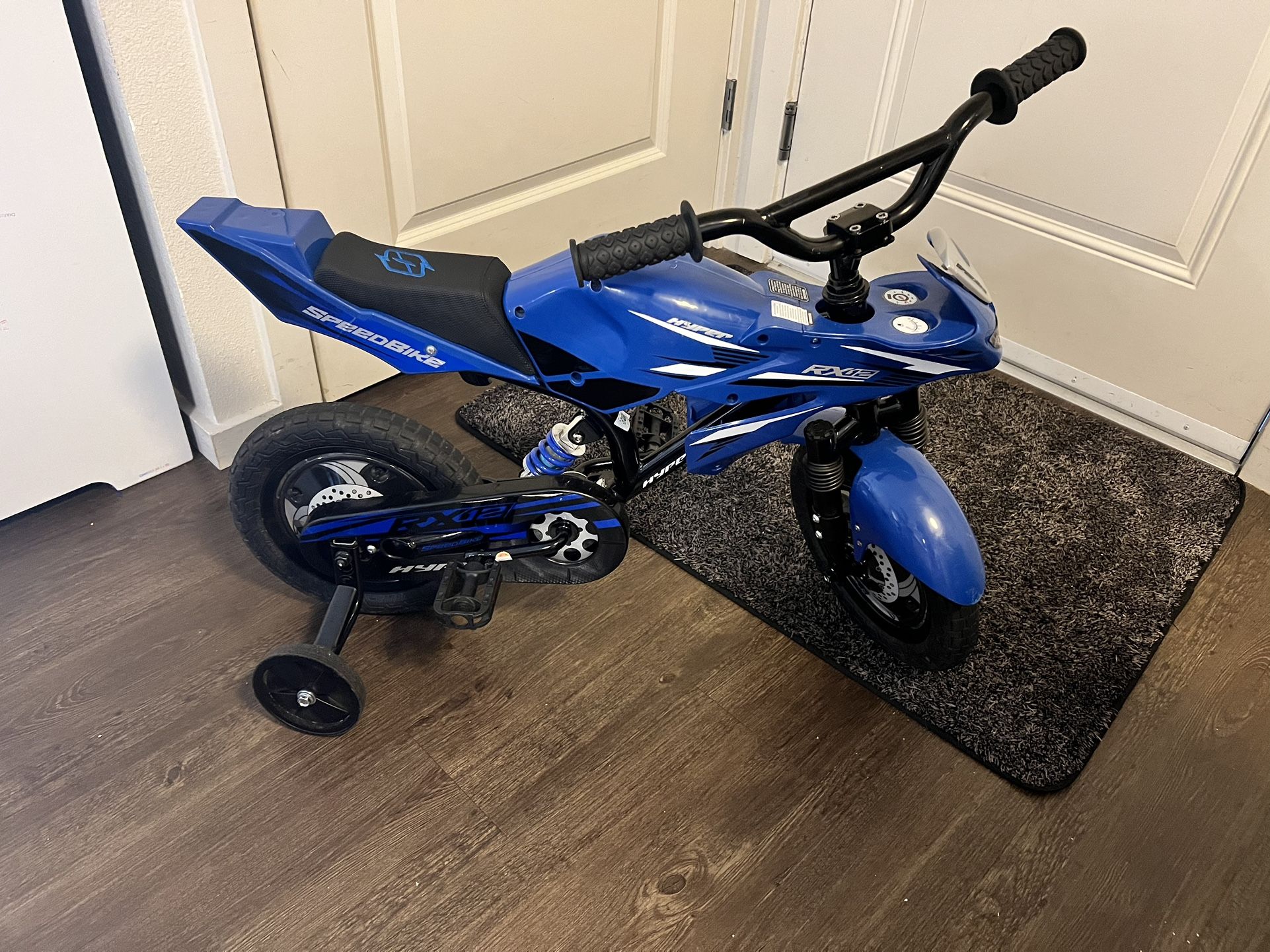 Toddler/Small Kid Bike with training wheels.