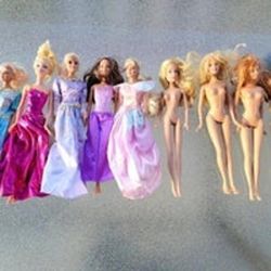 Lot of 9 Mixed Barbie Dolls