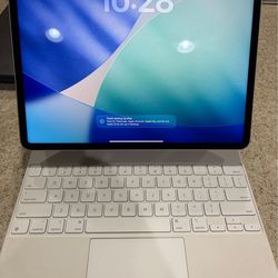 Excellent condition Apple iPad Pro 12.9 m2 gen 6 128gb Magic Keyboard WiFi plus cellular unlocked!