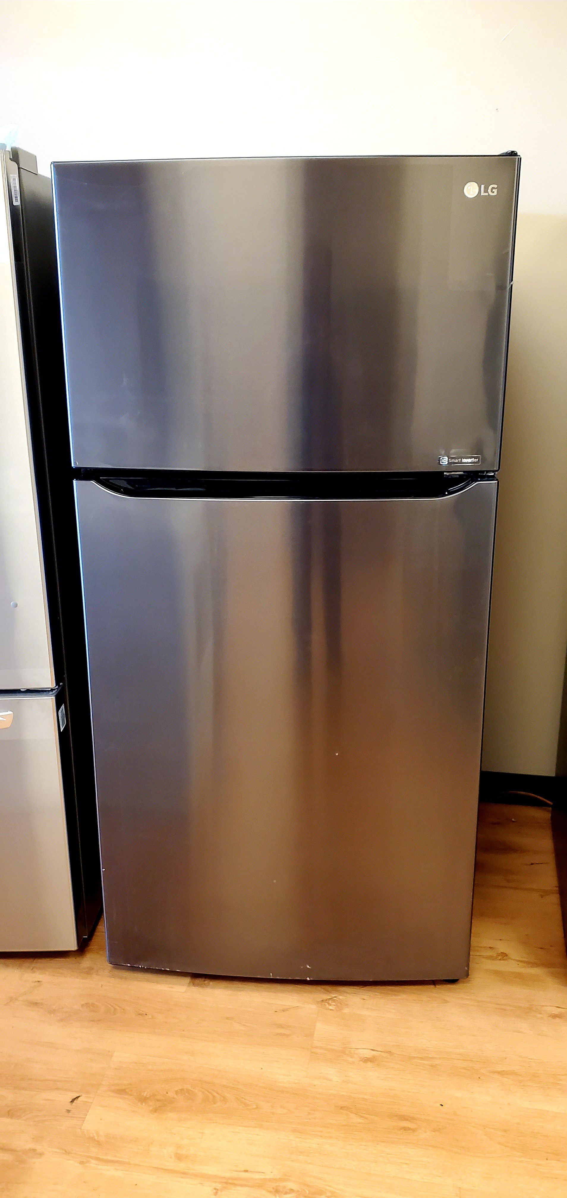 Brand new! Lg too n bottom refrigerator!