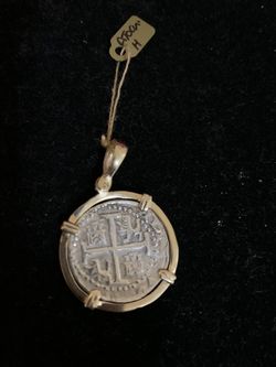 Atocha silver coin in gold bezel