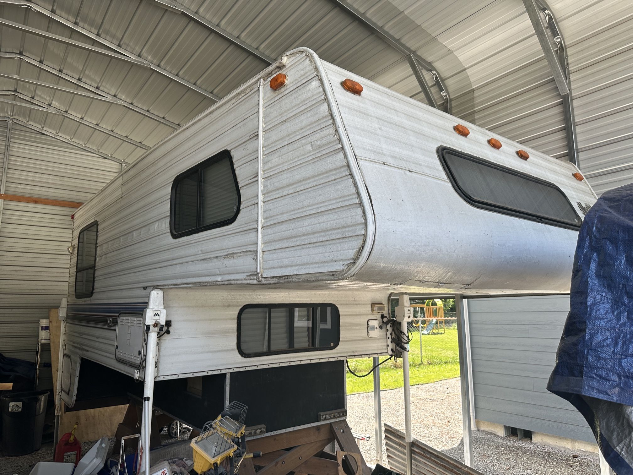 1996 10.5’ Northland Truck Camper