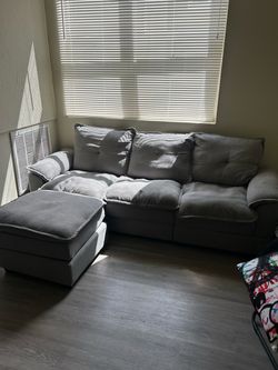 Grey Couch with leg rest