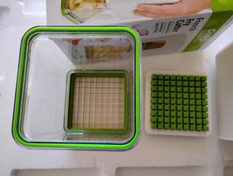French Fry Cutter - New in Box
 Make perfect fries or veggie sticks in seconds!  interchangeable blades for thick or thin cuts.
 Quick & Easy: Slices 