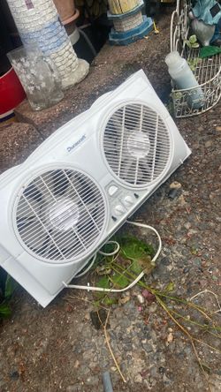 Window electric fan, pick up. E.  Side.  Tacoma
