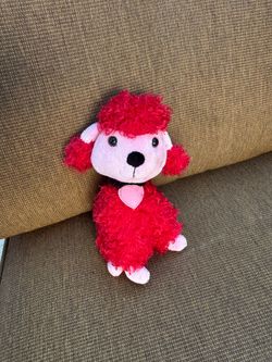 Small red poodle stuffed animal