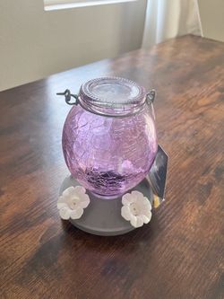 Glass bird feeder