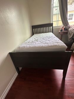 Dark brown bed Wood  and mattress