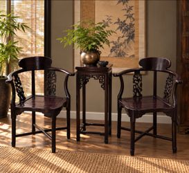 Chinese Rosewood Horseshoe Armchairs Set of 2 with matching plant table.