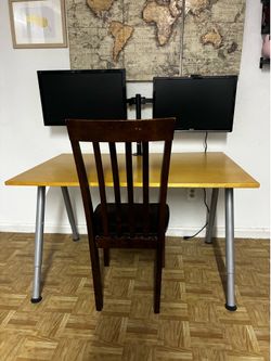 Desk with dual monitor stand with 2 monitors & a chair