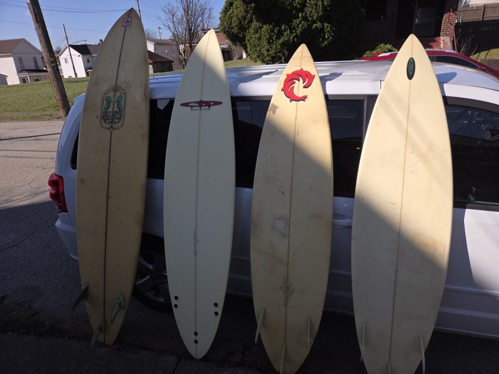 4 Surfboards With 2 Bags That Hold 3