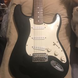 Squier Strat by Fender