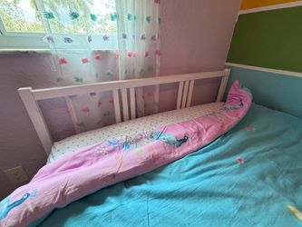 IKEA full bed frame with Serta mattress and topper pad