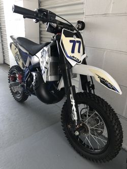 Blue JKS Racing dirt bike