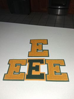 FOUR VINTAGE RARE LETTER E CHENILLE PATCHES