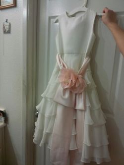 Layered White dress with pink flower attachment